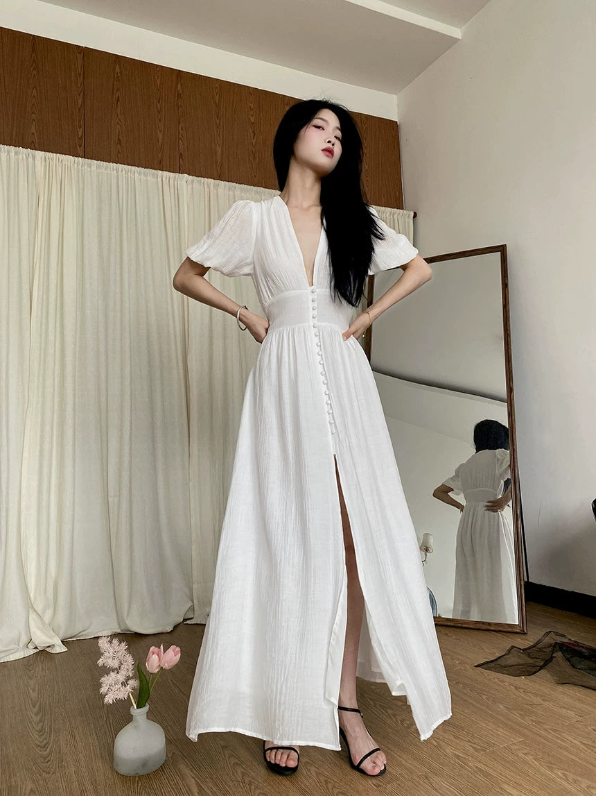 Ins style elegant dress with V-neck slit bubble sleeves for slimming desig simple long skirt